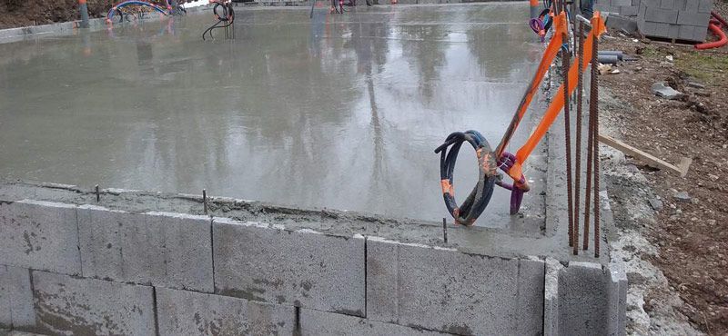 Comment faire une dalle de béton sur hérisson